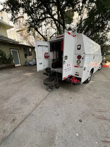 Magnet Plumbing service vehicle on-site for Grease Trap Cleaning in East Highland Park